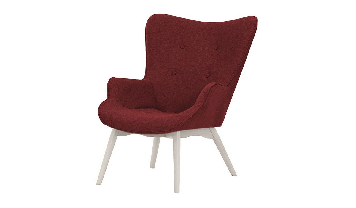 Czerwony fotel z białymi nogami